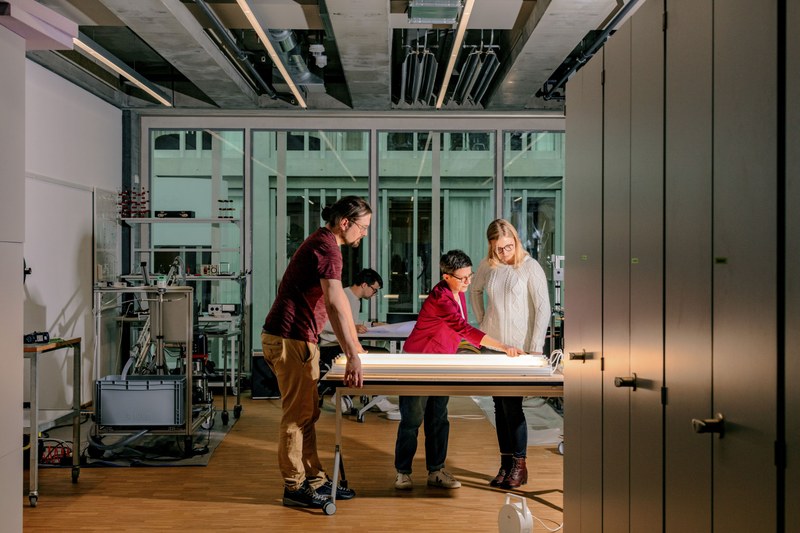 Researchers at the school of architecture debating about a plan