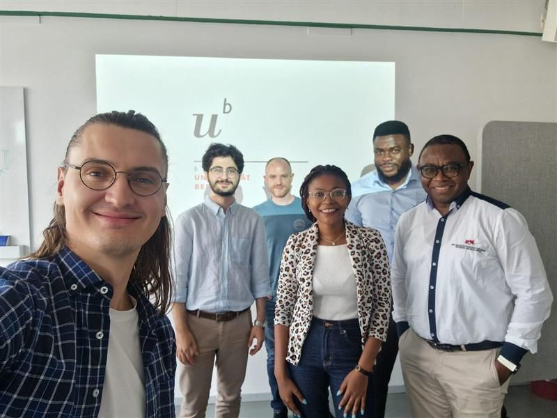 SwissAfricaCySec Community Workshop Series: Cryptographic Agility in the Realm of Post-Quantum-Secure Algorithms + Security and Privacy Concerns on Android Phones. Group photo of Roman Bögli, Erdem Uysal, Manuel Ohrndorf, Franka Ebai, Mr. Paddy Otu, and Dr. Carlson Eyongabi Ngwa.